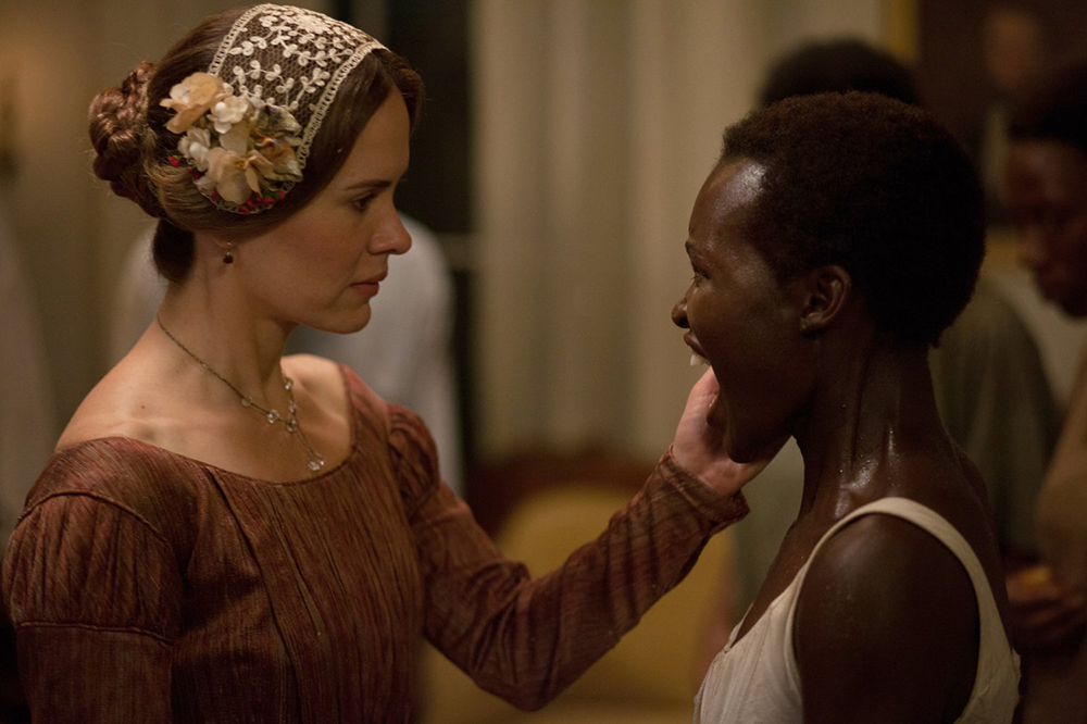 Sarah Paulson and Lupita Nyong’o in “12 Years a Slave” (2013). Photograph by Francois Duhamel / Fox Searchlight Pictures. 