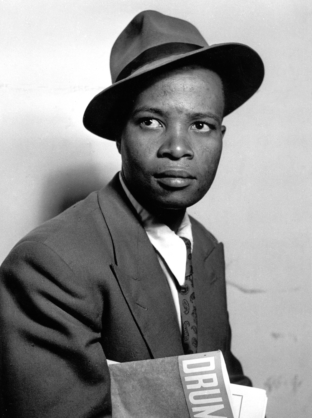 Henry Nxumalo as Mr. Drum, 1951. Photograph by Jürgen Schadeberg, www . jurgenschadeberg . com.