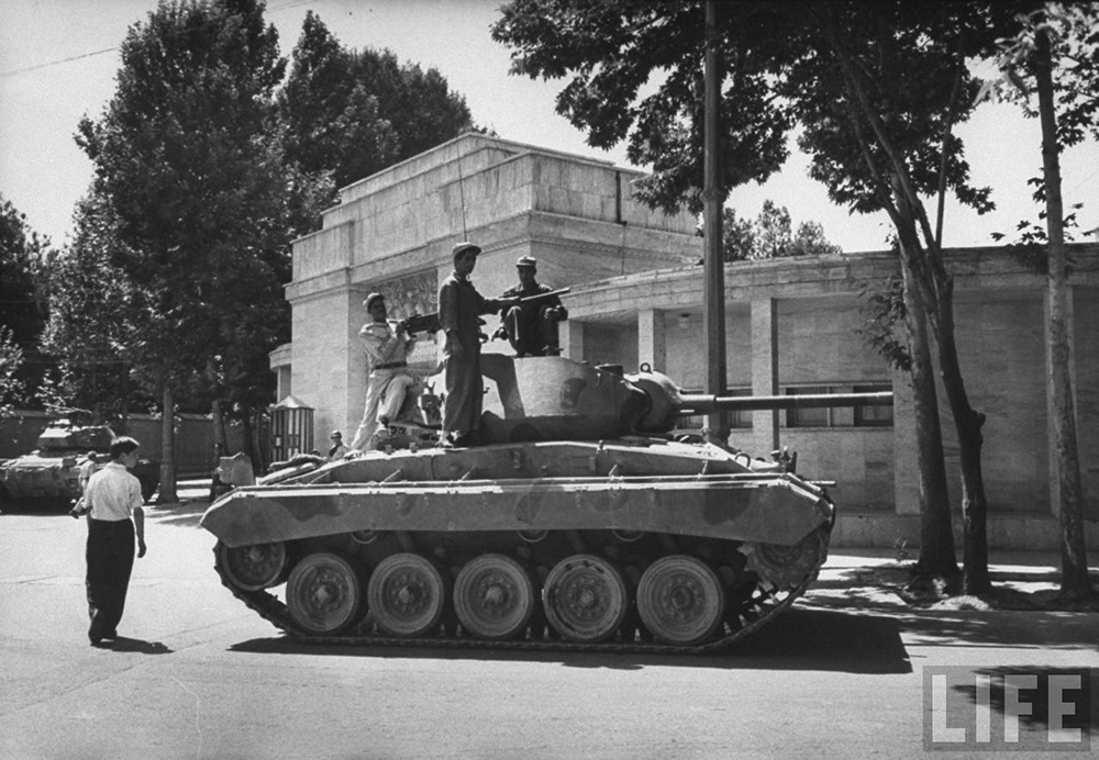 Tanks lining the streets during Shah Reza Pahlevi’s return home, 1953. Photograph by Carl Mydan / Life Magazine.