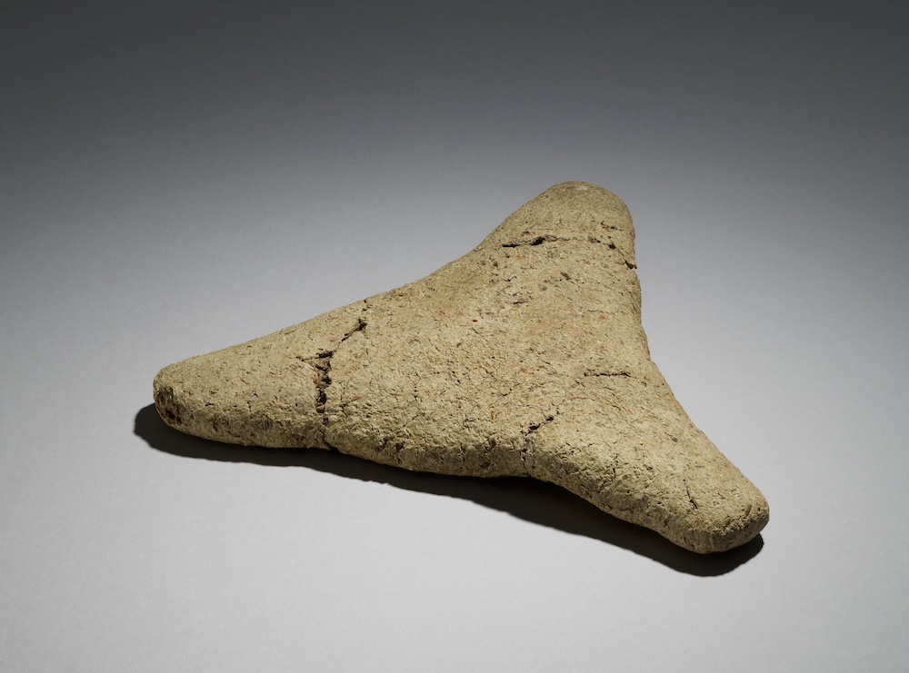 Three-cornered loaf of Egyptian bread, excavated from the 11th dynasty temple at Deir el-Bahri. © The Trustees of the British Museum. Three-cornered loaf of Egyptian bread, excavated from the 11th dynasty temple at Deir el-Bahri. © The Trustees of the British Museum.