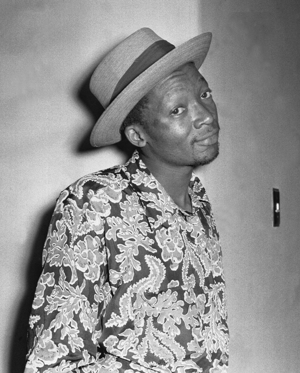 Can Themba, 1958. Photograph by Jürgen Schadeberg, www . jurgenschadeberg . com.