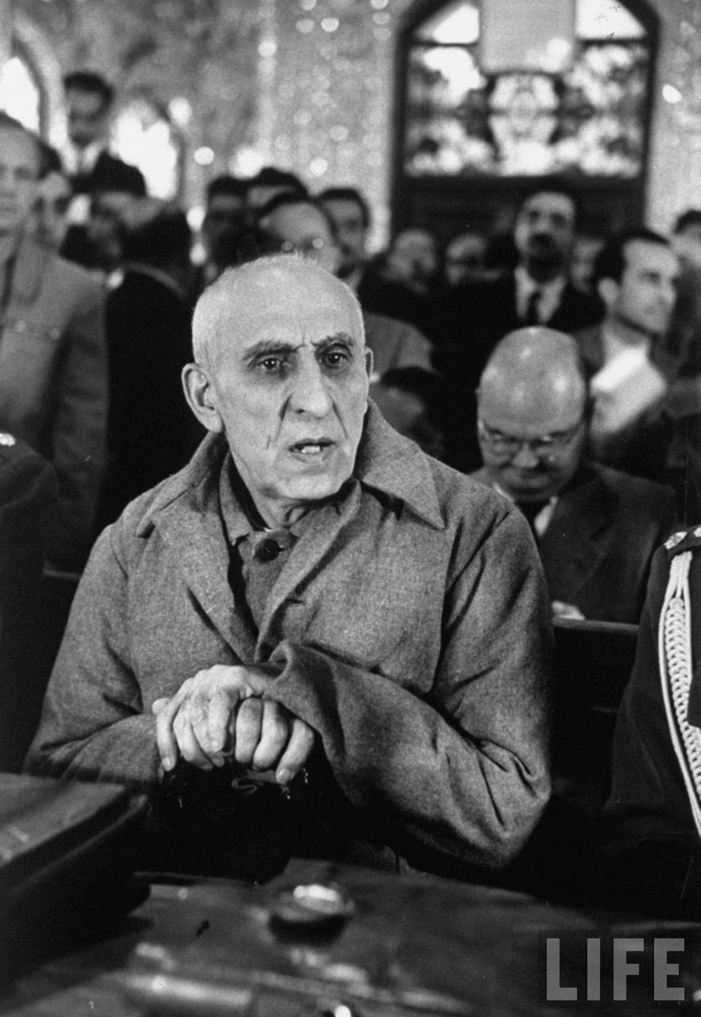 Mohamed Mossadegh, sitting in court, 1953. Photograph by Carl Mydans / Life Magazine.