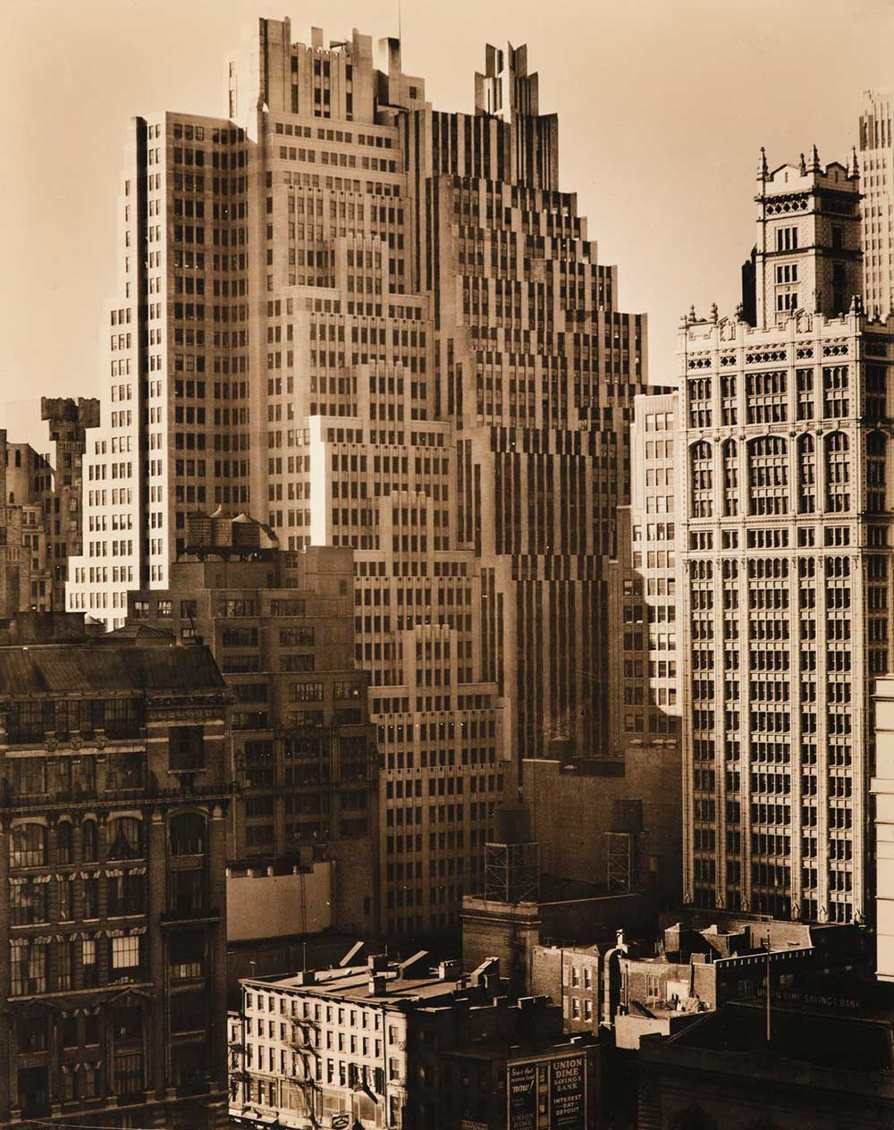 Fortieth Street Between Sixth and Seventh Avenues Looking Southwest From 42nd Street, Manhattan, by Berenice Abbott, 1935.
