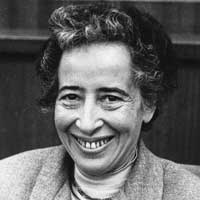 Photograph of a smiling woman with gray hair