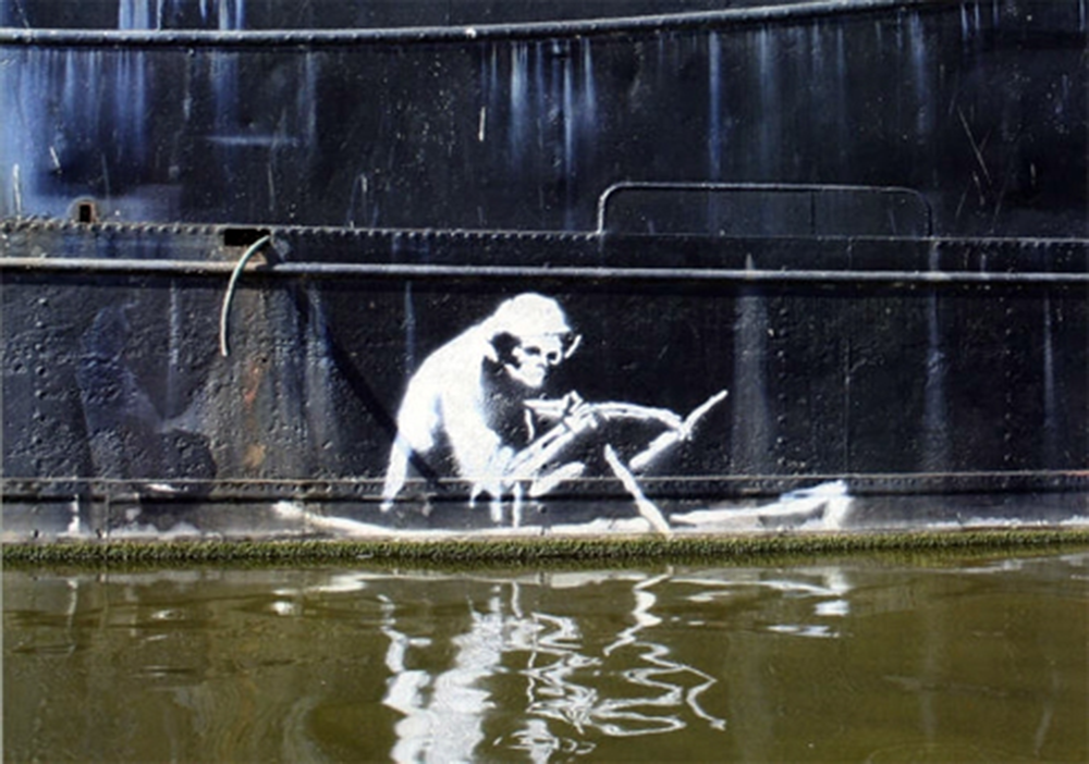 “The Silent Highwayman,” by Banksy, c. 2003. Spray-painted onto the side of a boat in Bristol harbor, England.