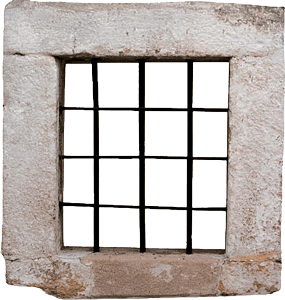 Barred window in a stone wall