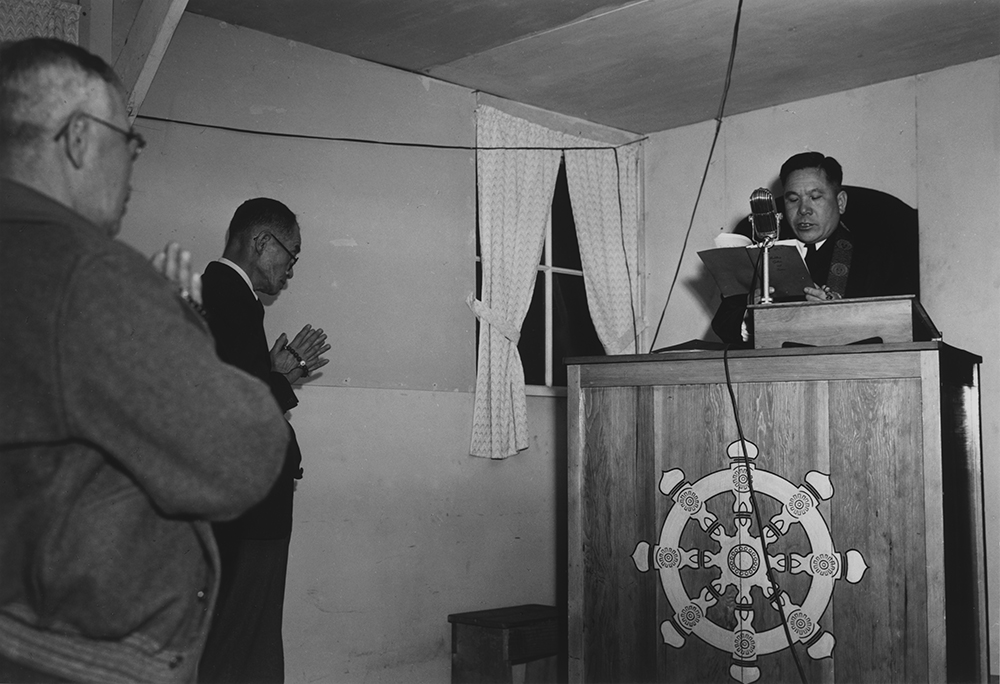Buddhist service, Manzanar Relocation Center, California, 1943. Photograph by Ansel Adams. Library of Congress, Prints and Photographs Division.