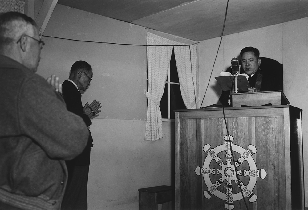 Buddhist service, Manzanar Relocation Center, California, 1943. Photograph by Ansel Adams. Library of Congress, Prints and Photographs Division.