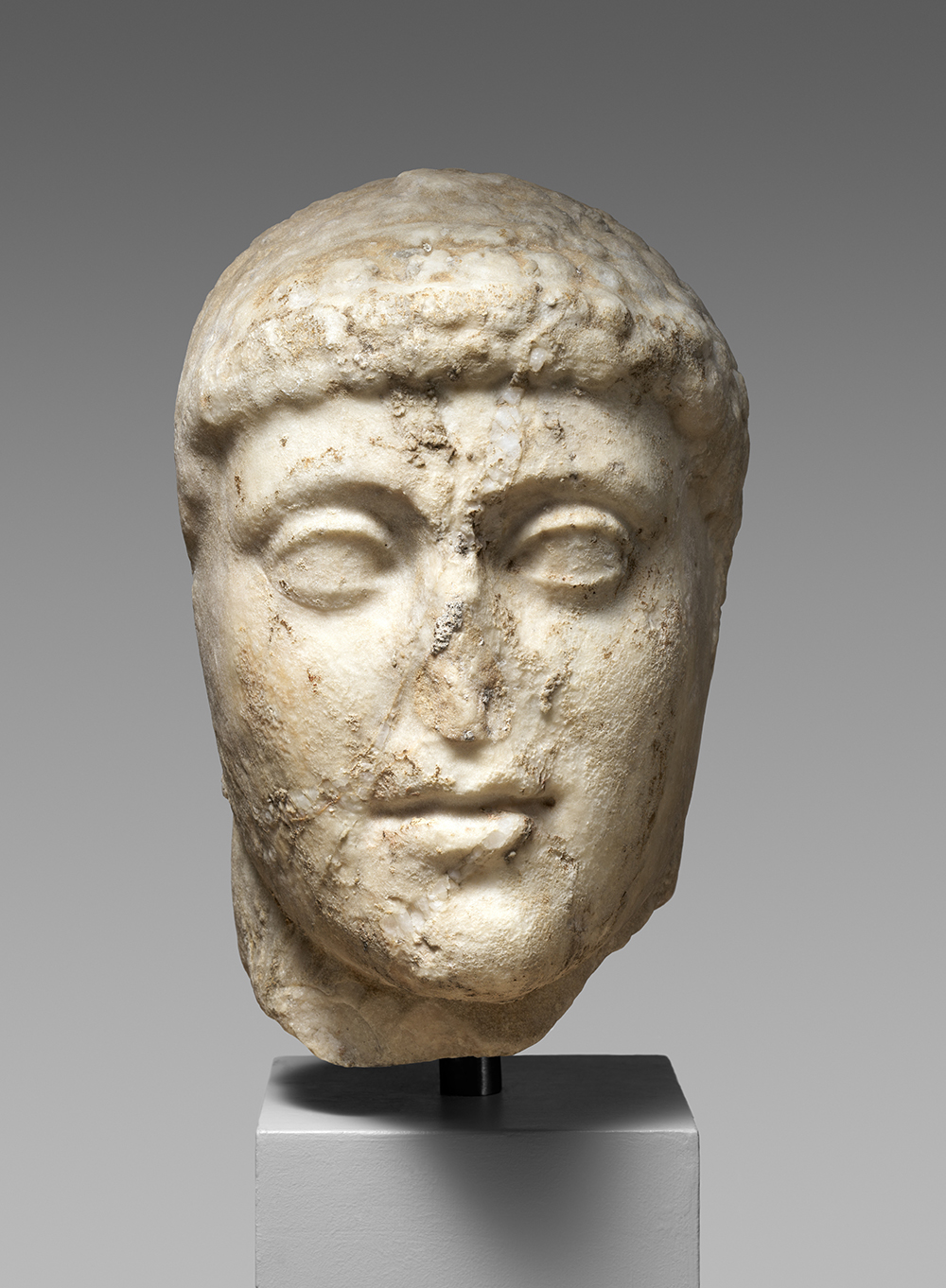 Marble head from a statue of Harmodius, originally attributed to Kritios and Nesiotes, c. 100.