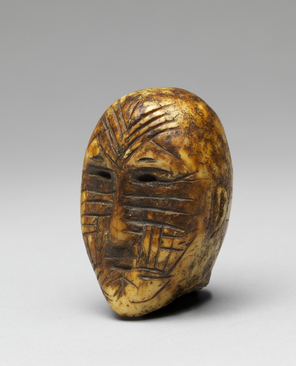 Head, Old Bering Sea, second to fourth century. The Metropolitan Museum of Art, Gift of Dorothy Elowitch, 1991.