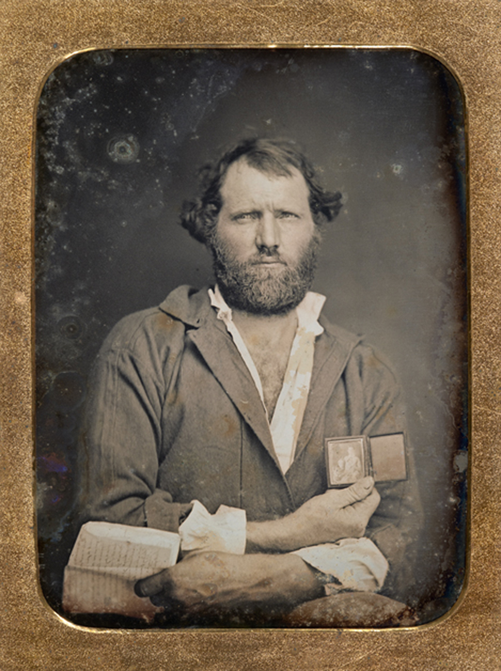 Portrait of a California gold miner with daguerreotype and letter, quarter-plate daguerreotype. c. 1852. The Nelson-Atkins Museum of Art.