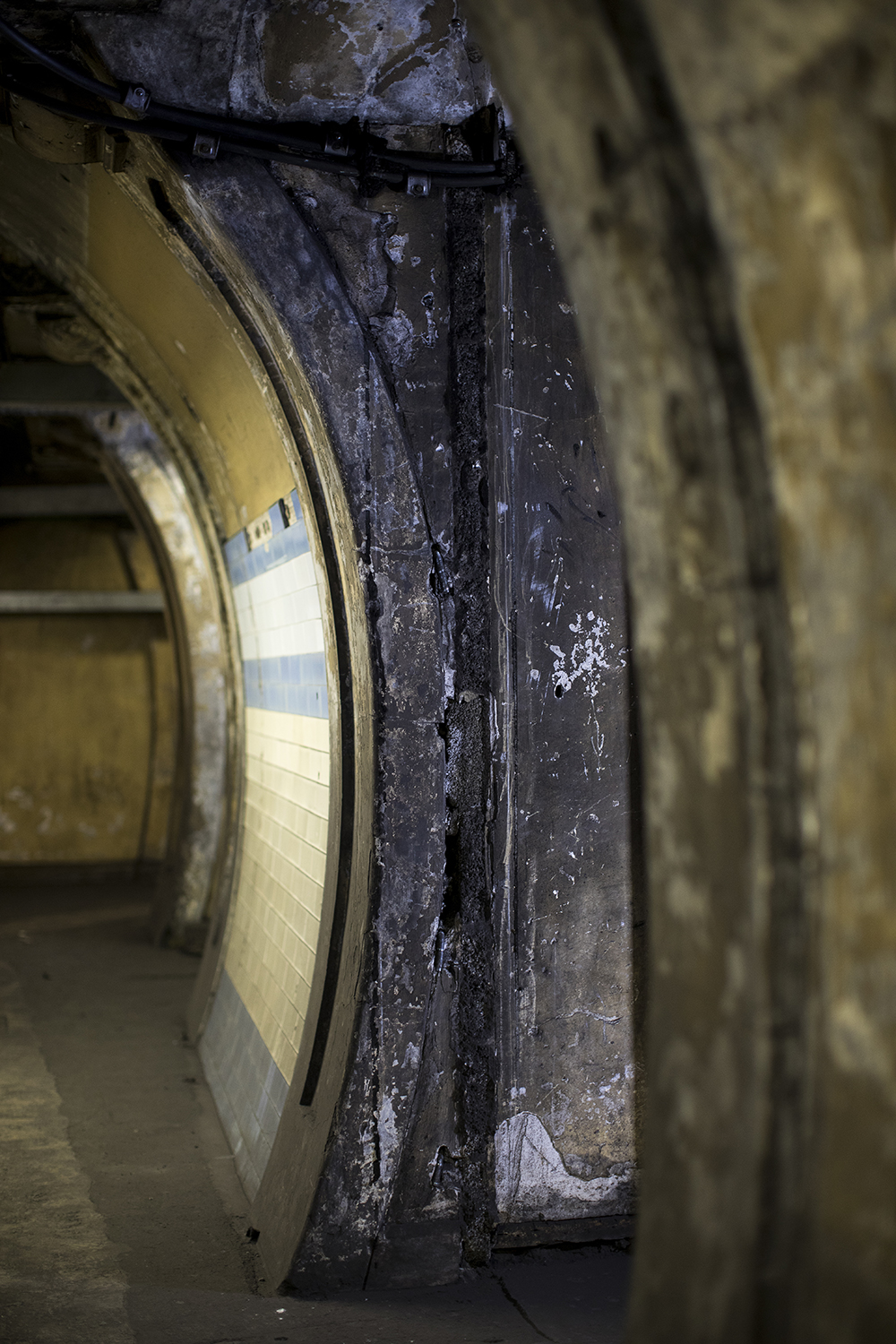 Extensive surviving witness marks in the wartime bunker conversion of the disused elevator shafts of Dover Street station (now Green Park). Marks like these were corroborated with surviving plans and helped to determine the layout of a similar conversion at Down Street for which plans no longer exist. Photograph by Toby Madden and Andy Davis.