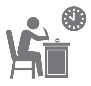 Figure writing at desk with clock above