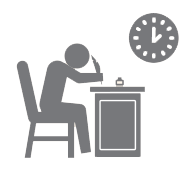 Figure writing while bent over desk with clock above