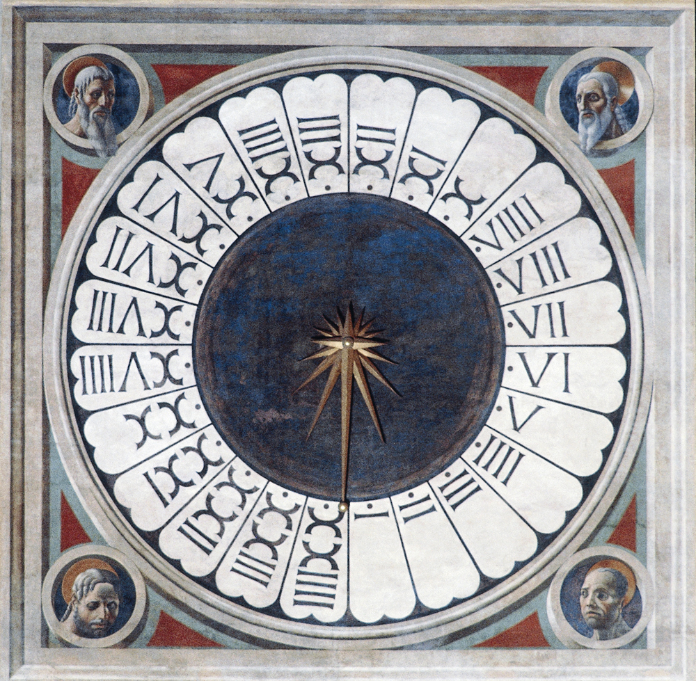 Clock with the heads of four prophets