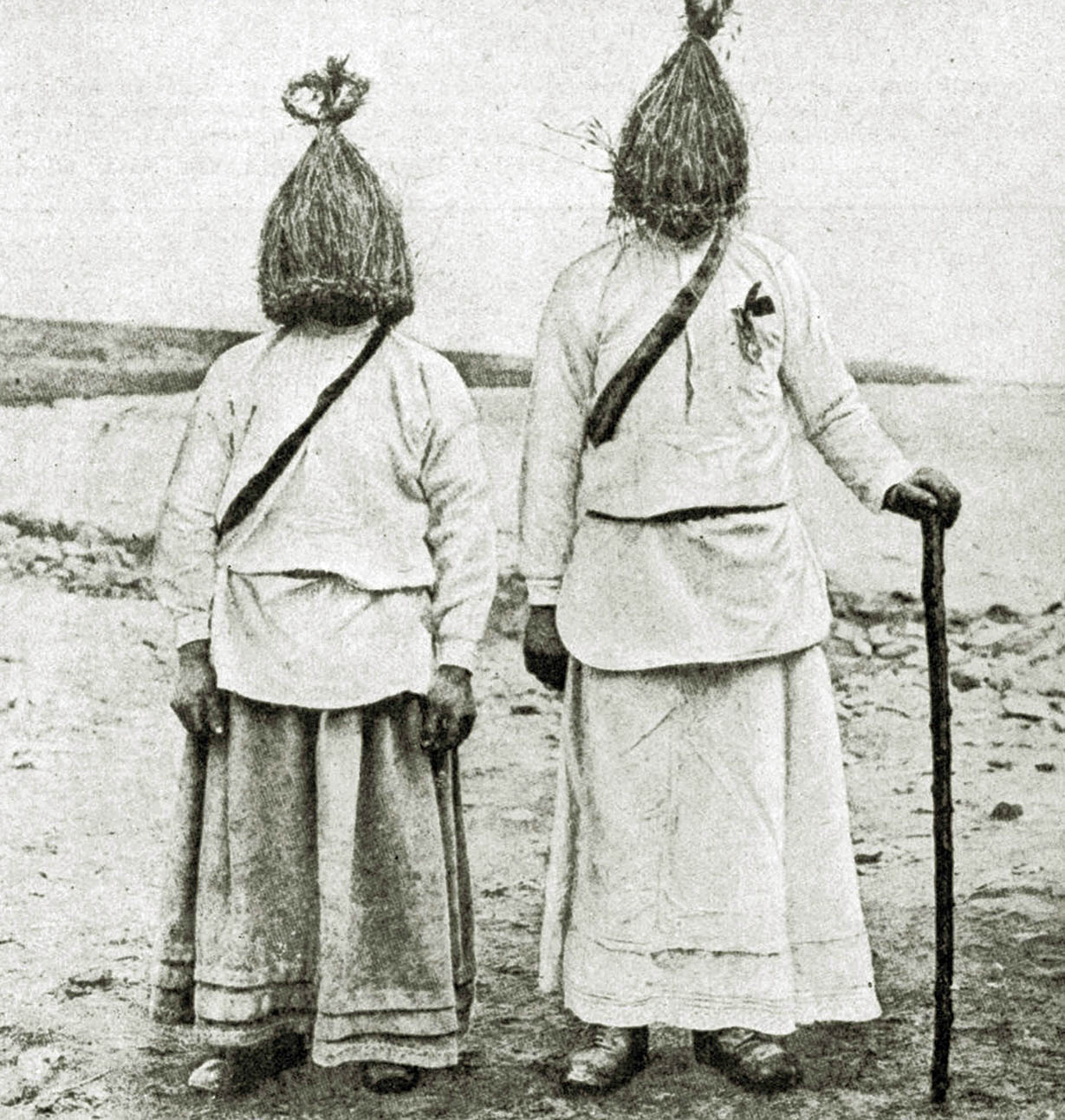 Men dressed in traditional “straw boy” costumes, Ireland, 1922.