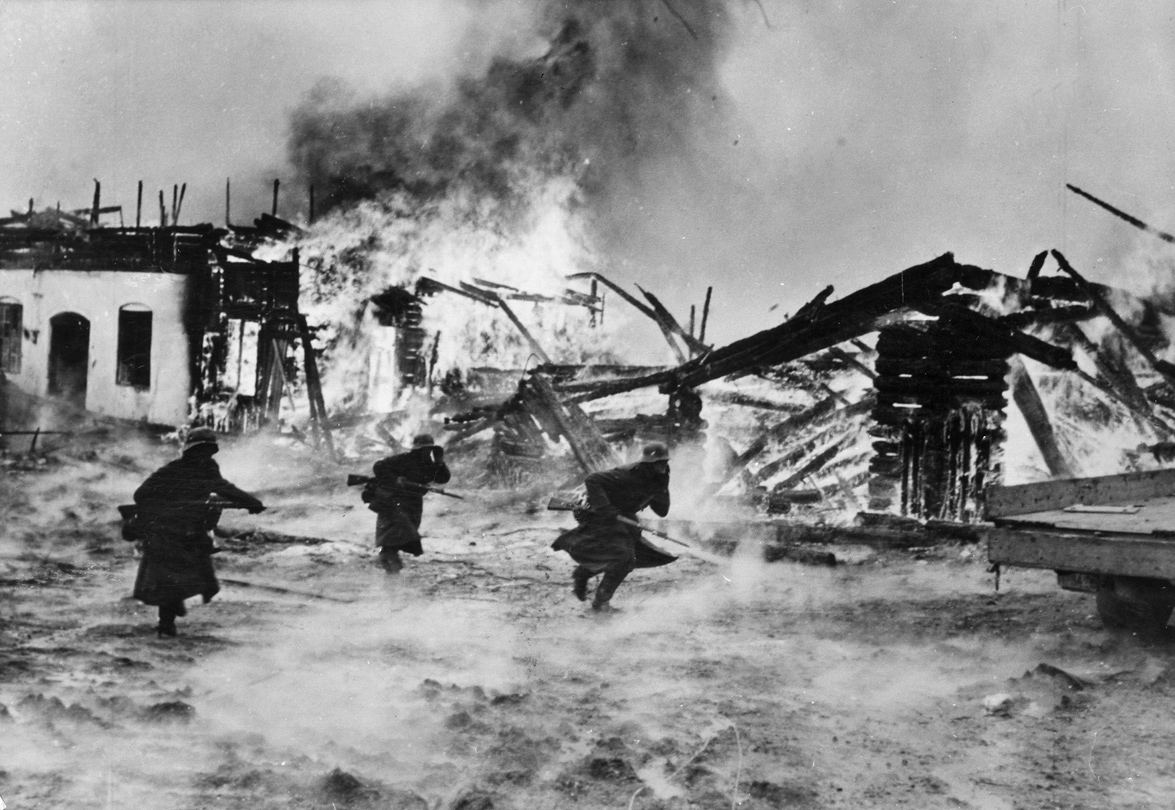 “Norway, Battle for a Burning Village,” German Wehrmacht in Haugsbygd, Norway, 1940. Photography by Erich Borchert. German Federal Archives. 