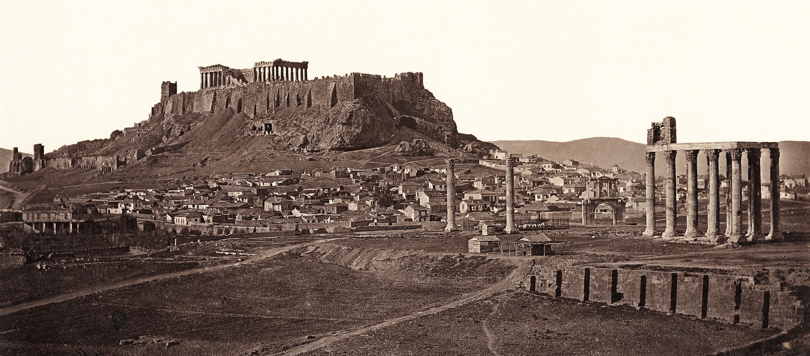 Black and white photograph of the Acropolis in Athens. 