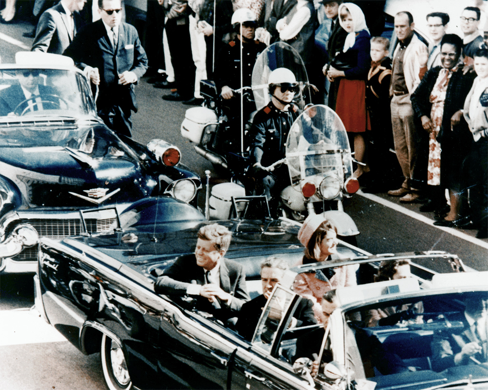  President John F.  Kennedy minutes before his assassination, Main Street, Dallas, Texas, 1963. Photograph by Walt Cisco. 