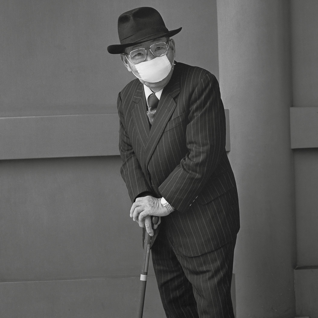 An Old Man With a Penetrating Gaze, from the series Asakusa Portraits, by Hiroh Kikai, 2001.