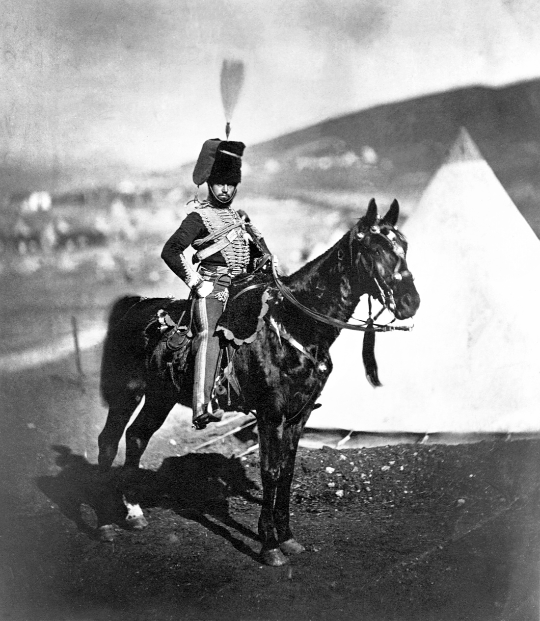 Cornet Wilkin of the 11th Hussars at camp in the Crimean War, 1855. Photograph by Roger Fenton. United States Library of Congress Prints and Photographs division, Washington D.C. 