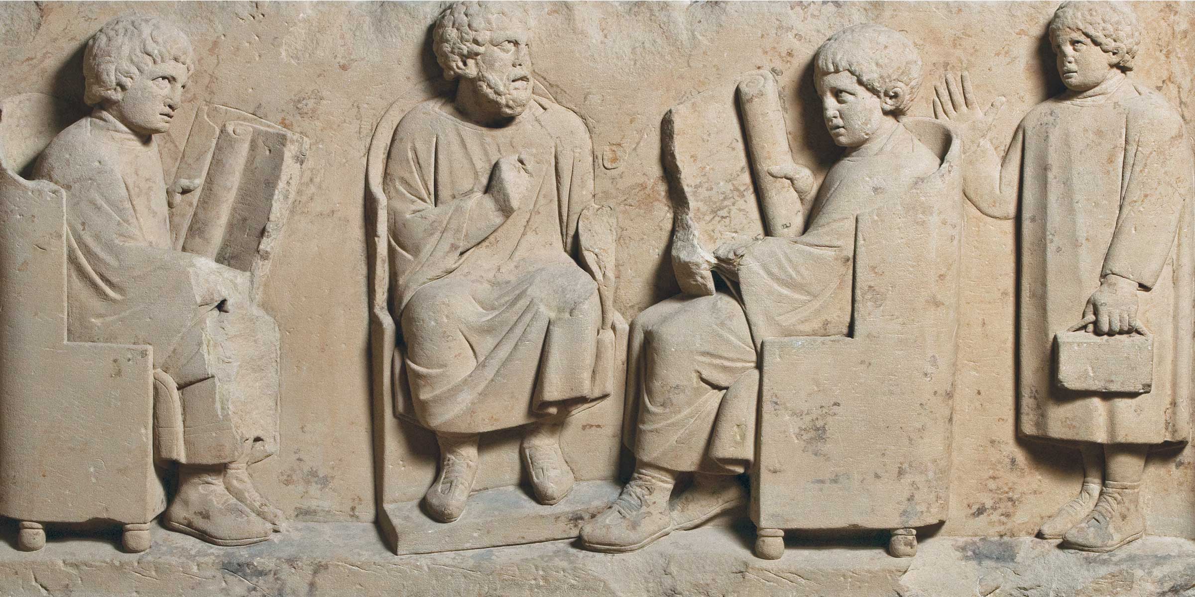 Roman funerary relief with a school scene, Germany, c. 185.