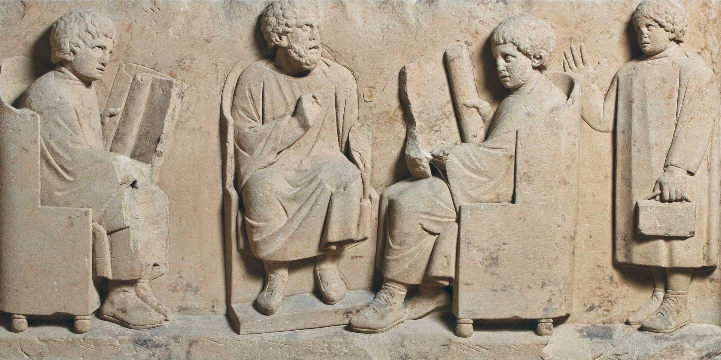 Roman funerary relief with a school scene, Germany, c. 185. bpk Bildagentur / Rheinisches Landesmuseum / Thomas Zühmer / Art Resource, NY. Roman funerary relief with a school scene, Germany, c. 185.
