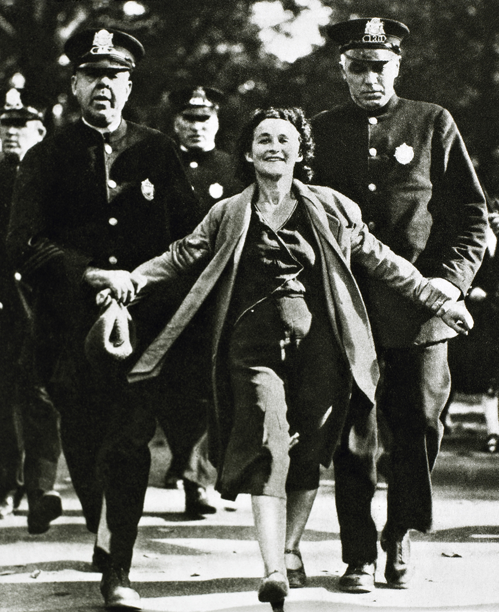 Labor organizer Edith Berkman being arrested during a textile workers’ strike, Lawrence, Massachusetts, 1933.