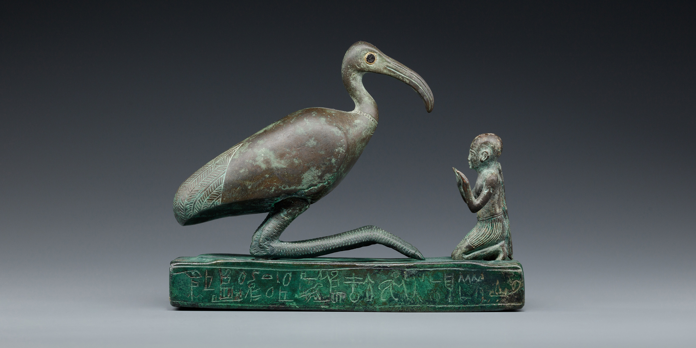 Devotee worshipping an ibis representing the god Thoth, Egypt, seventh or sixth century BC.