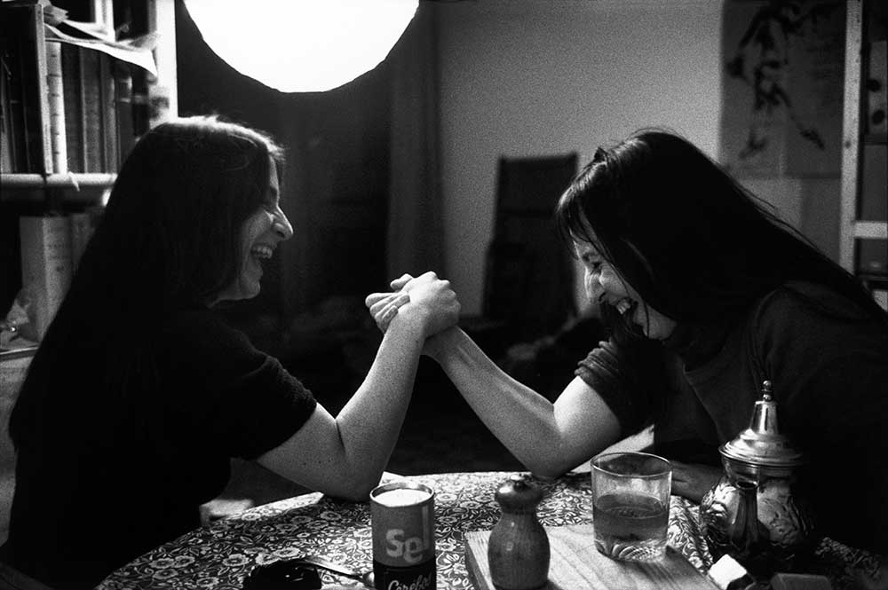 Friends arm wrestling, Paris, 1975. Photograph by Richard Kalvar.