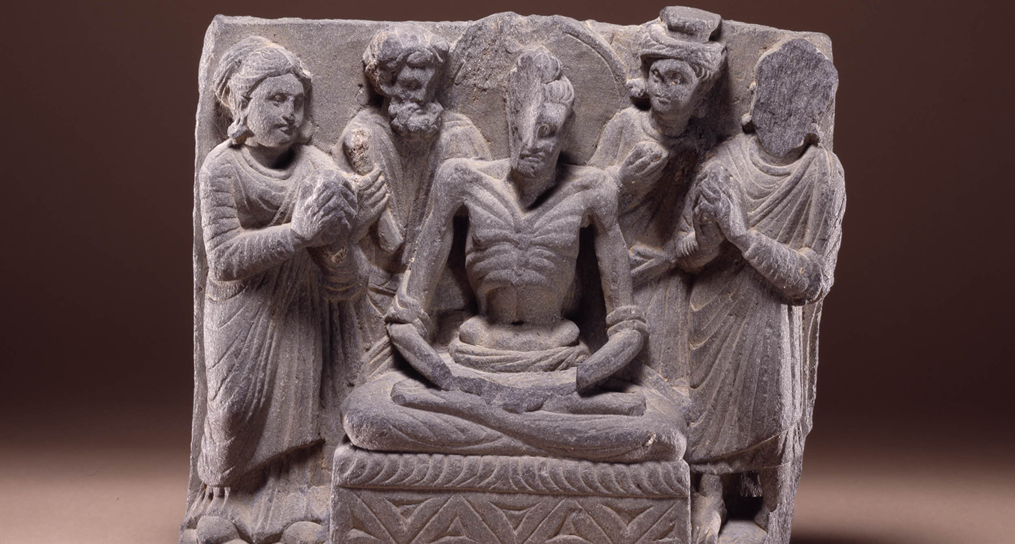 An emaciated Bodhisattva seated on a throne flanked by gods and worshippers, second to third century, Gandhara. The British Museum.