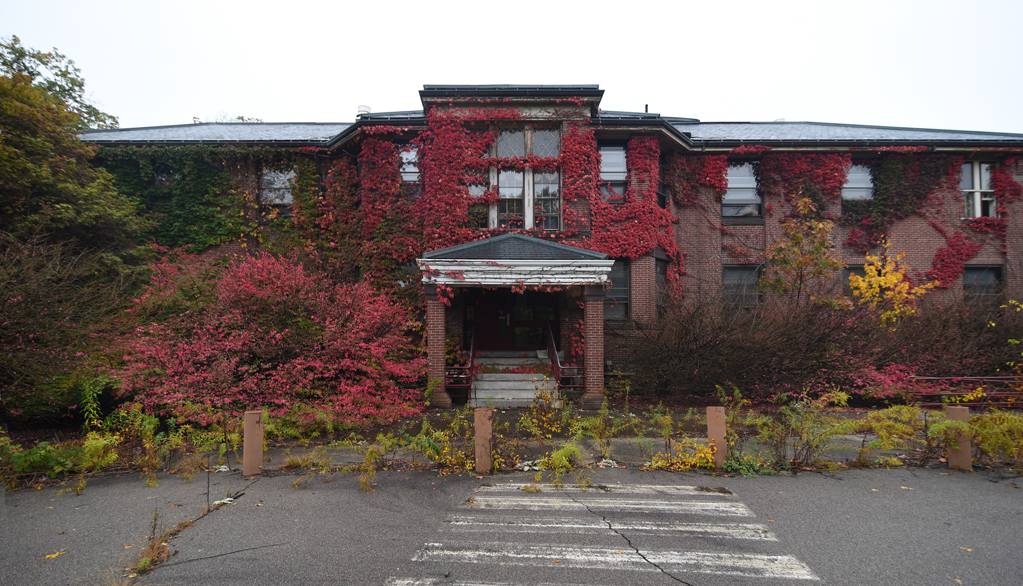 The Walter E. Fernald State School, 2016. Constructed in 1906, Dolan Hall was used as a dormitory for over a century. Photograph by David Whitemyer.