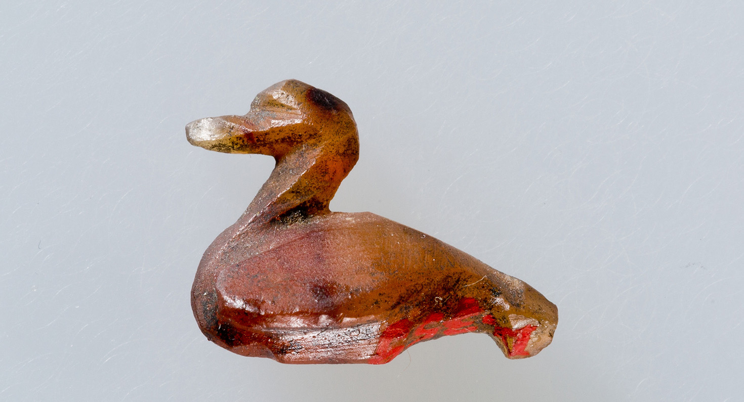 Duck amulet.