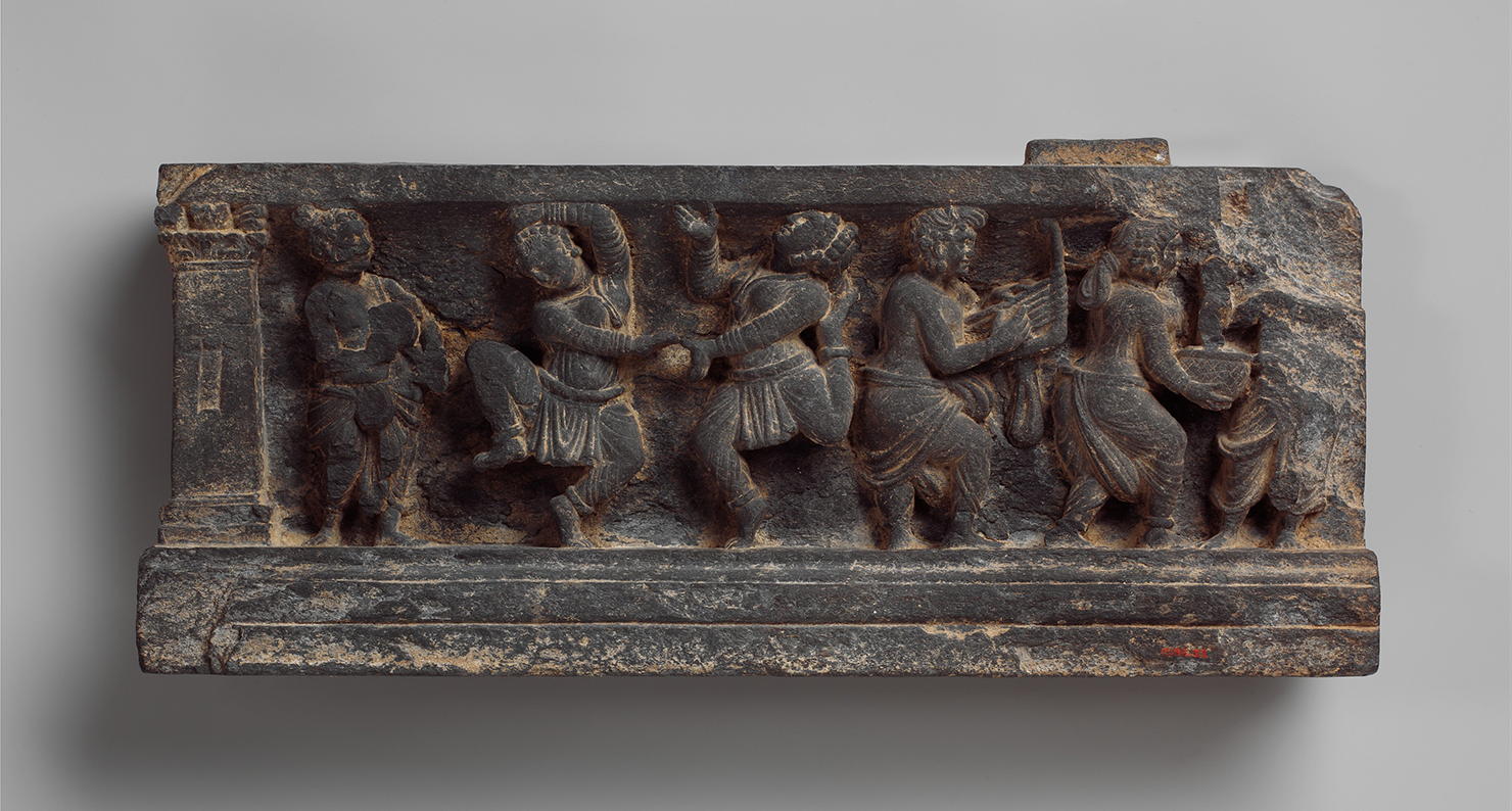 Dionysian scene with musicians and dancers, stair riser, Pakistan, first century. The Metropolitan Museum of Art.