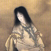 Woman with black hair and a pale face