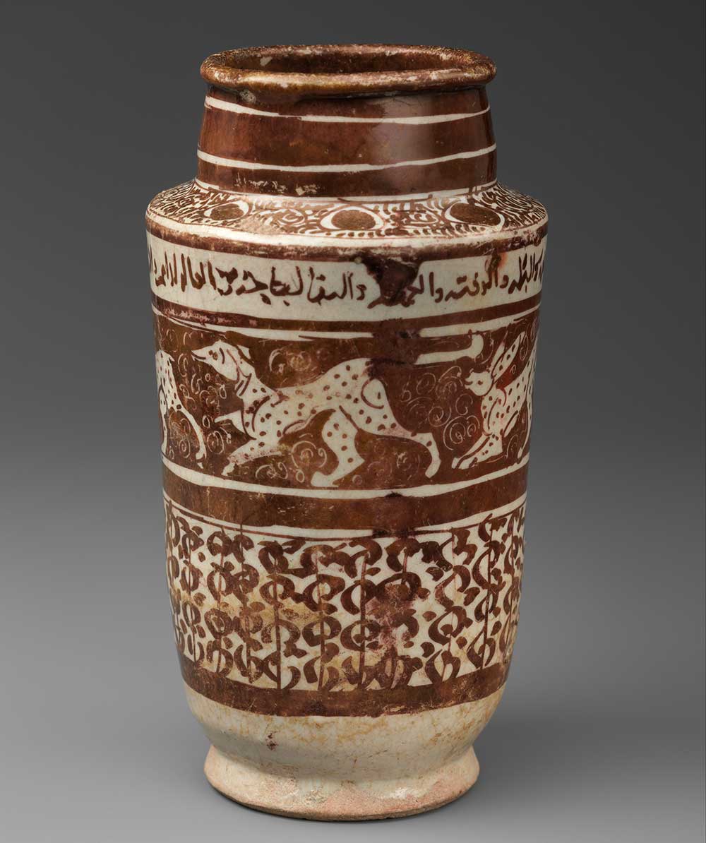 Apothecary jar with running hares and a dog.