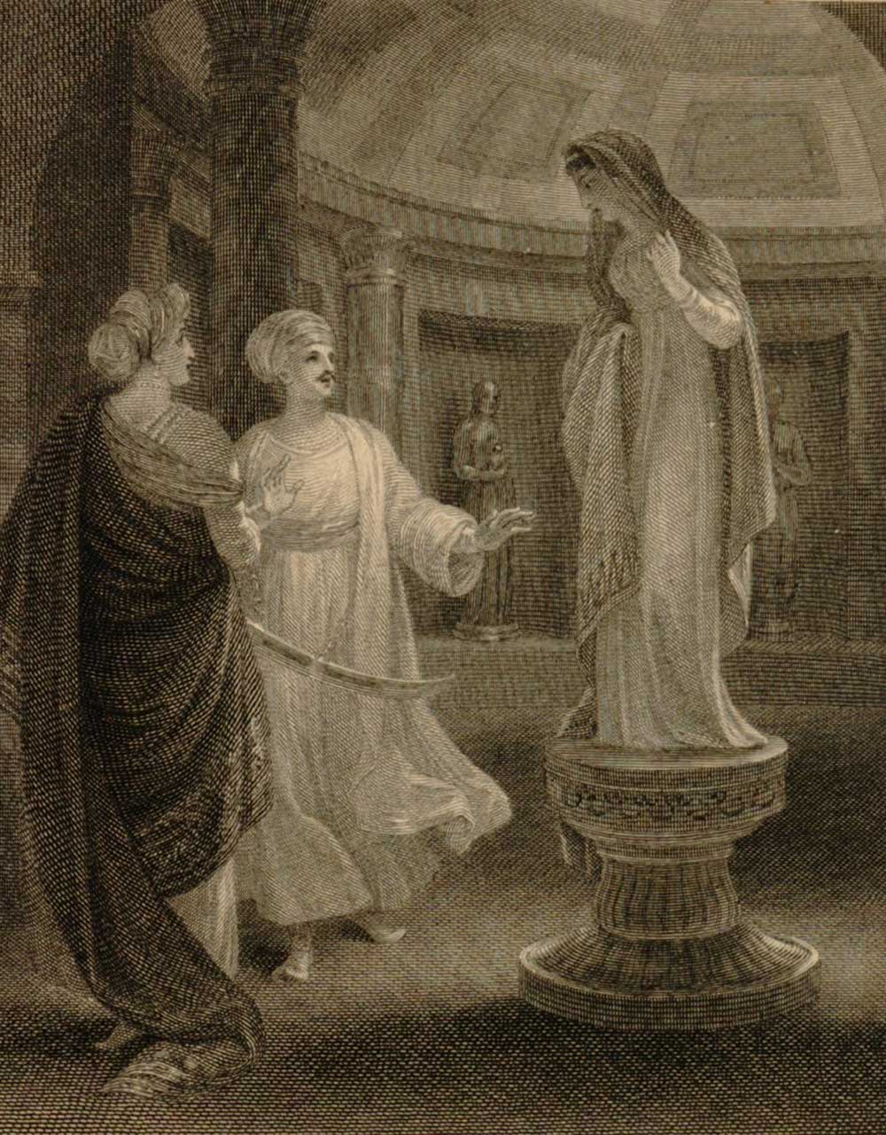 A woman and man in a circular hall look at a woman standing on a pedestal.