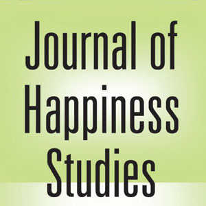 A detail from the cover of the Journal of Happiness Studies. A green background with black text that reads Journal of Happiness Studies.