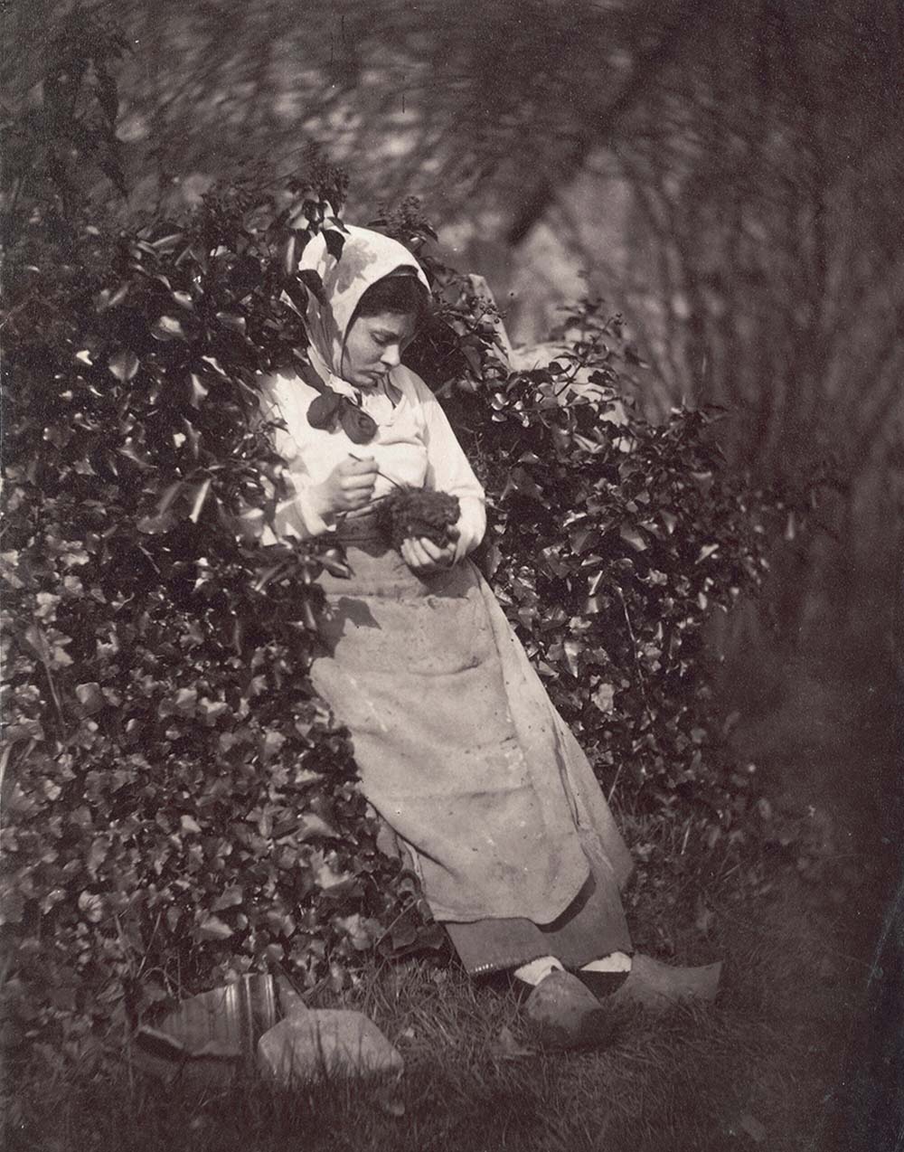 Peasant Woman Holding Small Animal, c. 1875. 