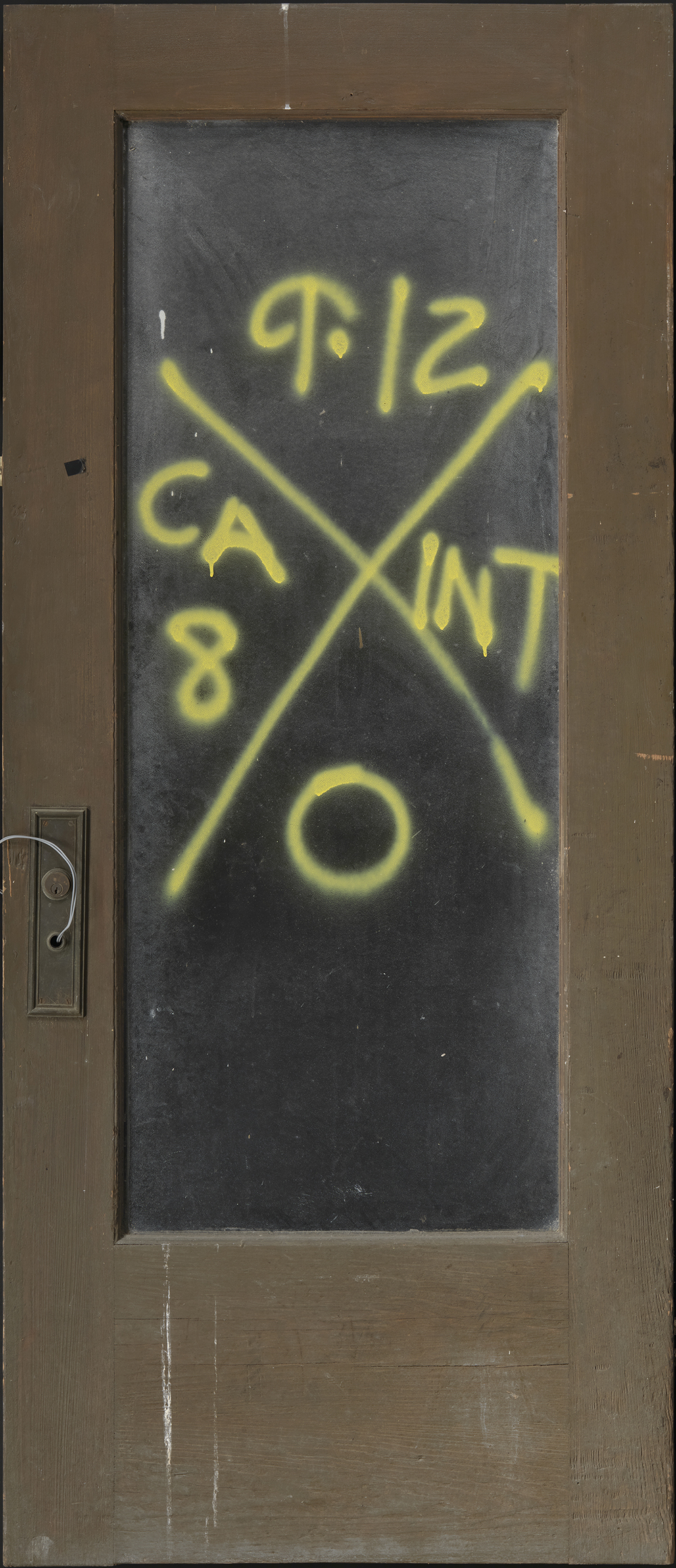 Door with rescue markings from Hurricane Katrina, c. 2005. Smithsonian National Museum of African American History and Culture.