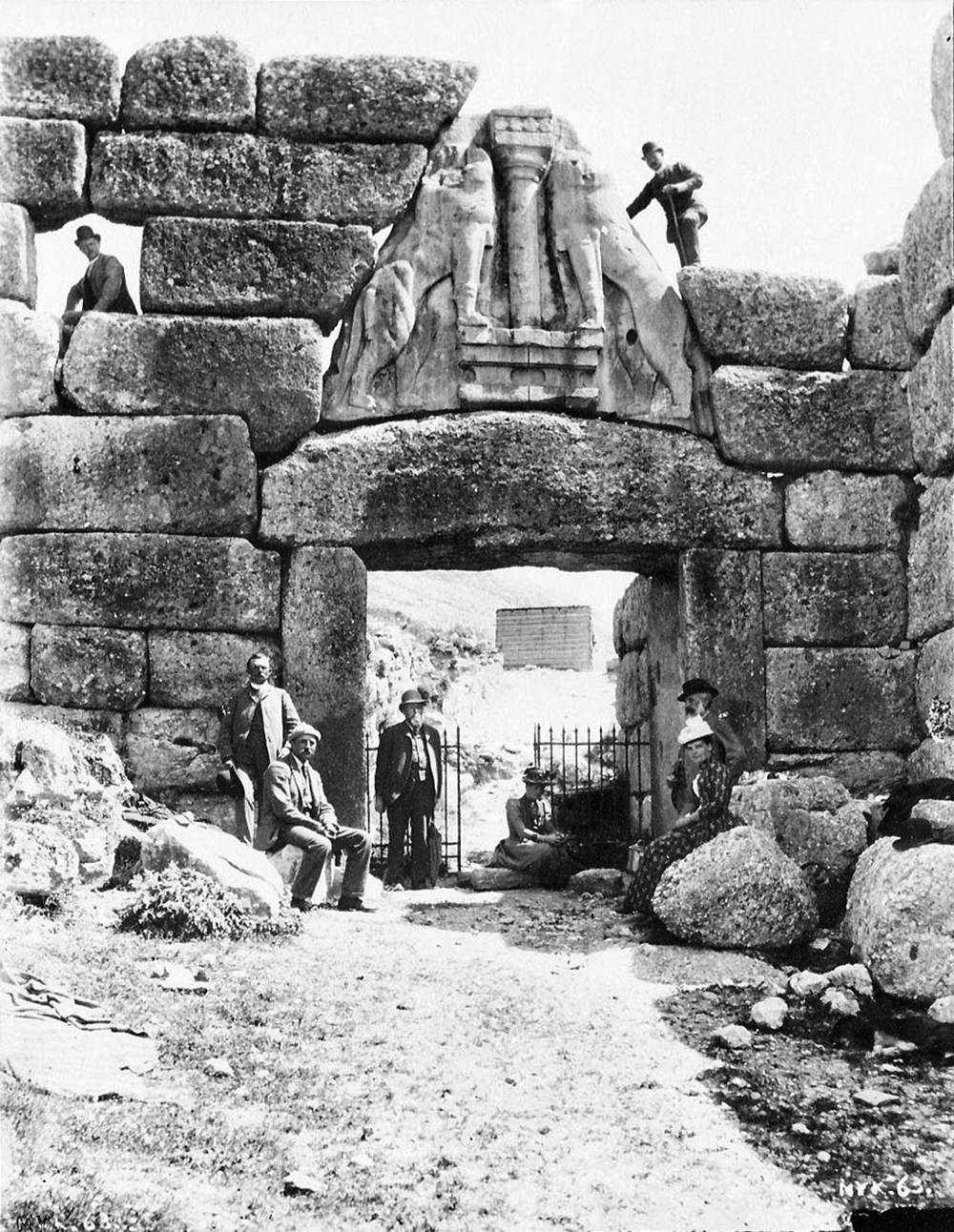 Wilhelm Dörpfeld (upper left) and Heinrich Schliemann (upper right) at the Lion Gate of Mycenae, c. 1884–85.