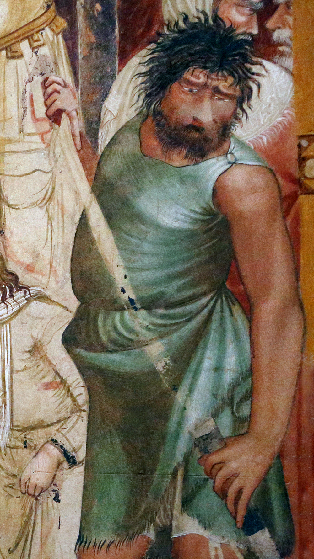 Detail of an executioner from The Martyrdom of the Franciscans, fresco by Ambrogio Lorenzetti, c. 1330. Photograph by Saliko. Wikimedia Commons.