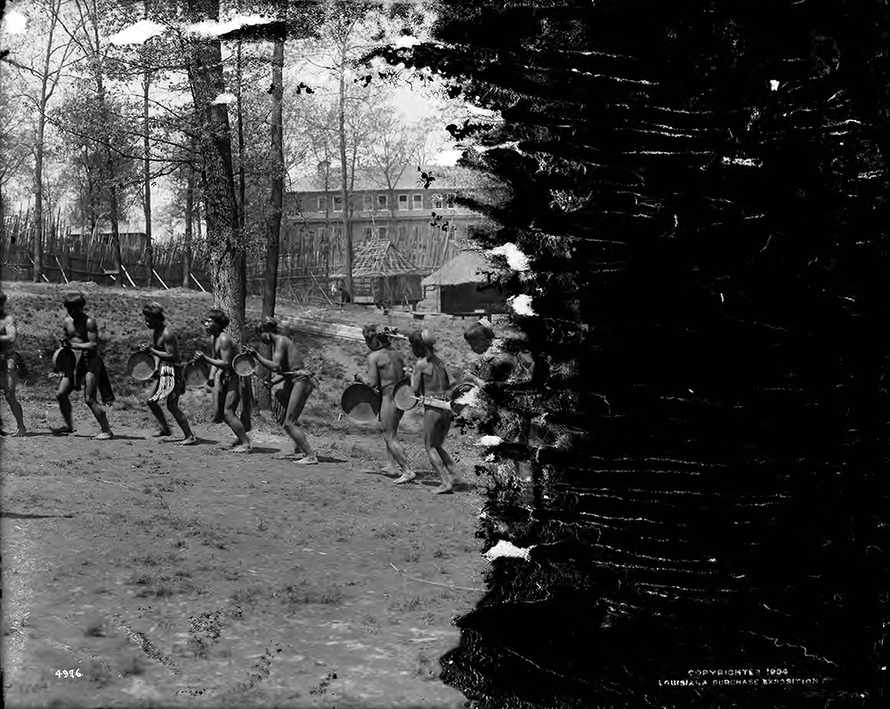 Bontoc Igorot men perform dances in the Philippine Exposition at the Louisiana Purchase Exposition, c. 1904. St. Louis Public Library, Louisiana Purchase Exposition glass plate negative collection.