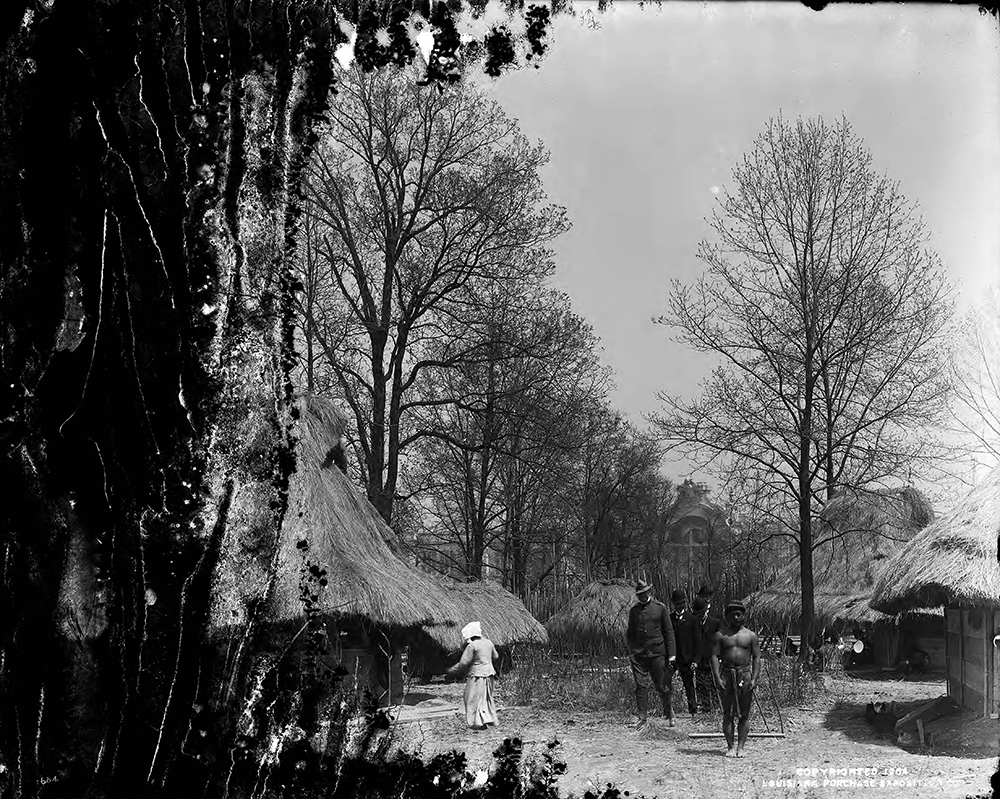 Officials with the Louisiana Purchase Exposition visit the Igorot village in the Philippine exposition, c. 1904. St. Louis Public Library, Louisiana Purchase Exposition glass plate negative collection.