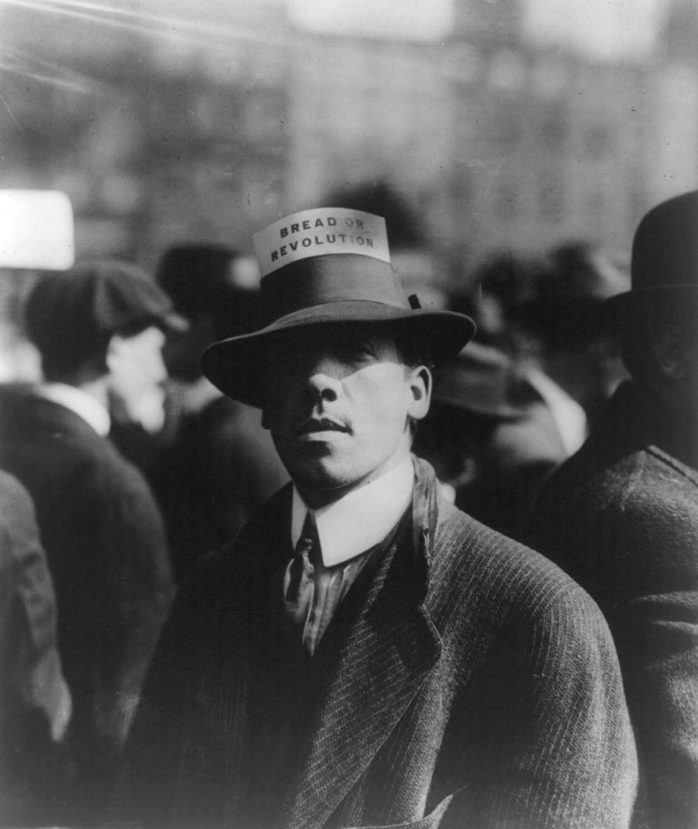 IWW worker with “Bread or Revolution” hat card, 1914. Photograph by Bain News Service.