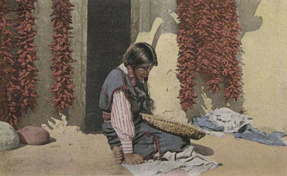 Postcard depicting a Hopi woman and red peppers, early 20th century. New York Public Library, The Miriam and Ira D. Wallach Division of Art, Prints and Photographs.