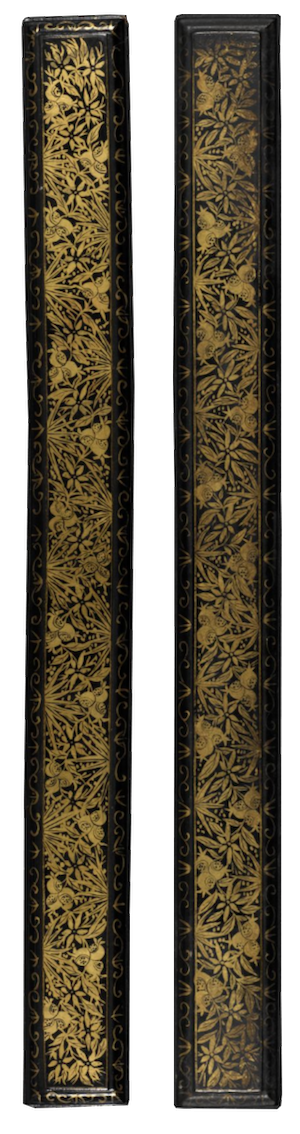 A binding for a Thai palm-leaf manuscript, a Royal edition of Pannasa Jatakas. The binding is long thin strips of wood lacquered in black and ornately covered in gold-leaf vines, leaves, and fruit.