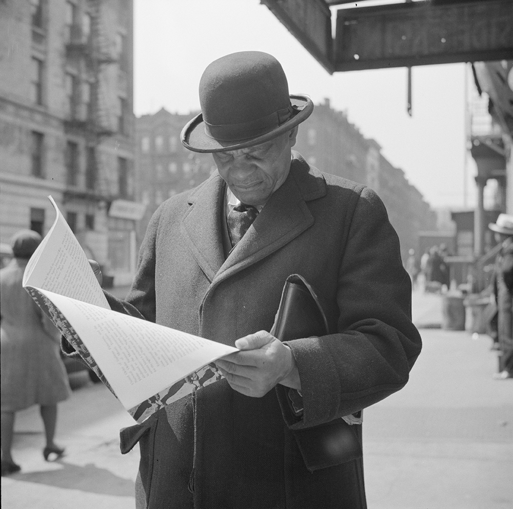 A Marcus Garveyite reading the OWI publication Negroes and the War, 1943. Photograph by Gordon Parks. Library of Congress, Prints and Photographs Division.