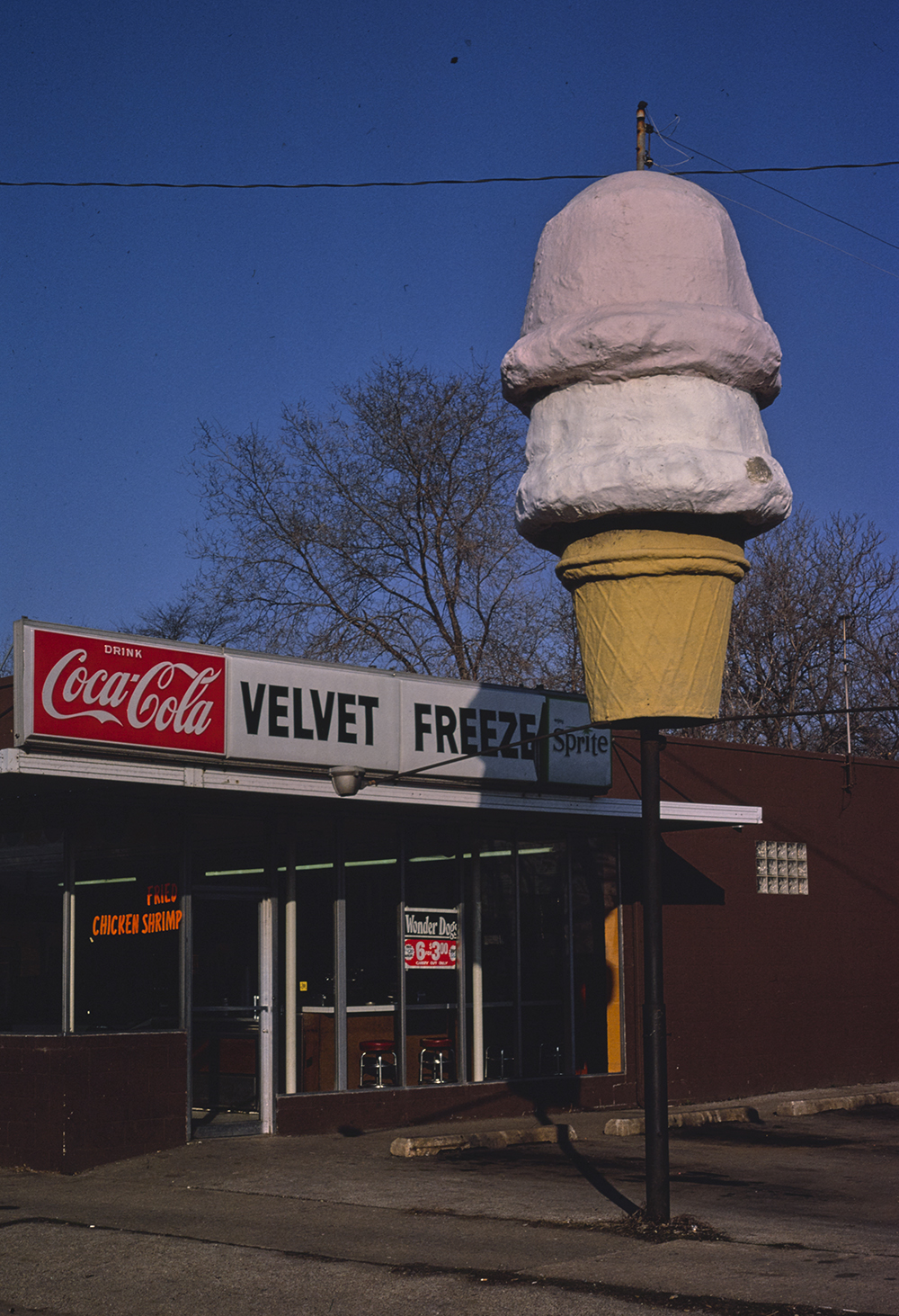 Photograph of Velvet Freeze ice cream sign, Peoria, Illinois, 1980, by John Margolies. Library of Congress, Prints and Photographs Division, John Margolies Roadside America Photograph Archive.