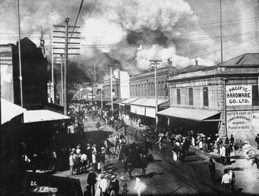 A fire in 1900 burned most of the Chinatown of Honolulu. The fire had been set to destroy houses suspected of being infected with bubonic plague. Hawaii State Archives.